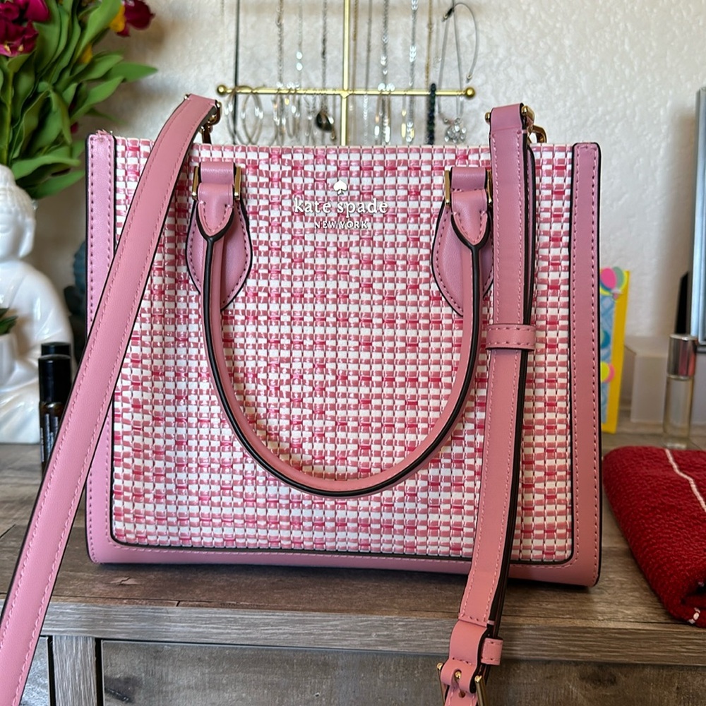 Like new Kate Spade purse.   Pink and White
